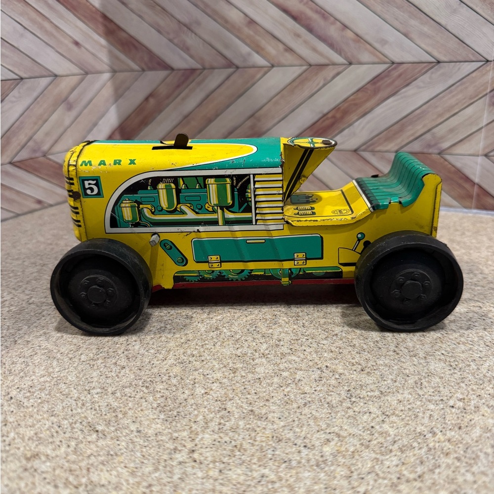 Nonworking Marx 5 wind up Tin Tractor 1950s.
